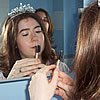 Edith putting on make-up before the wedding