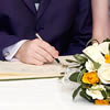 Paul signing the register